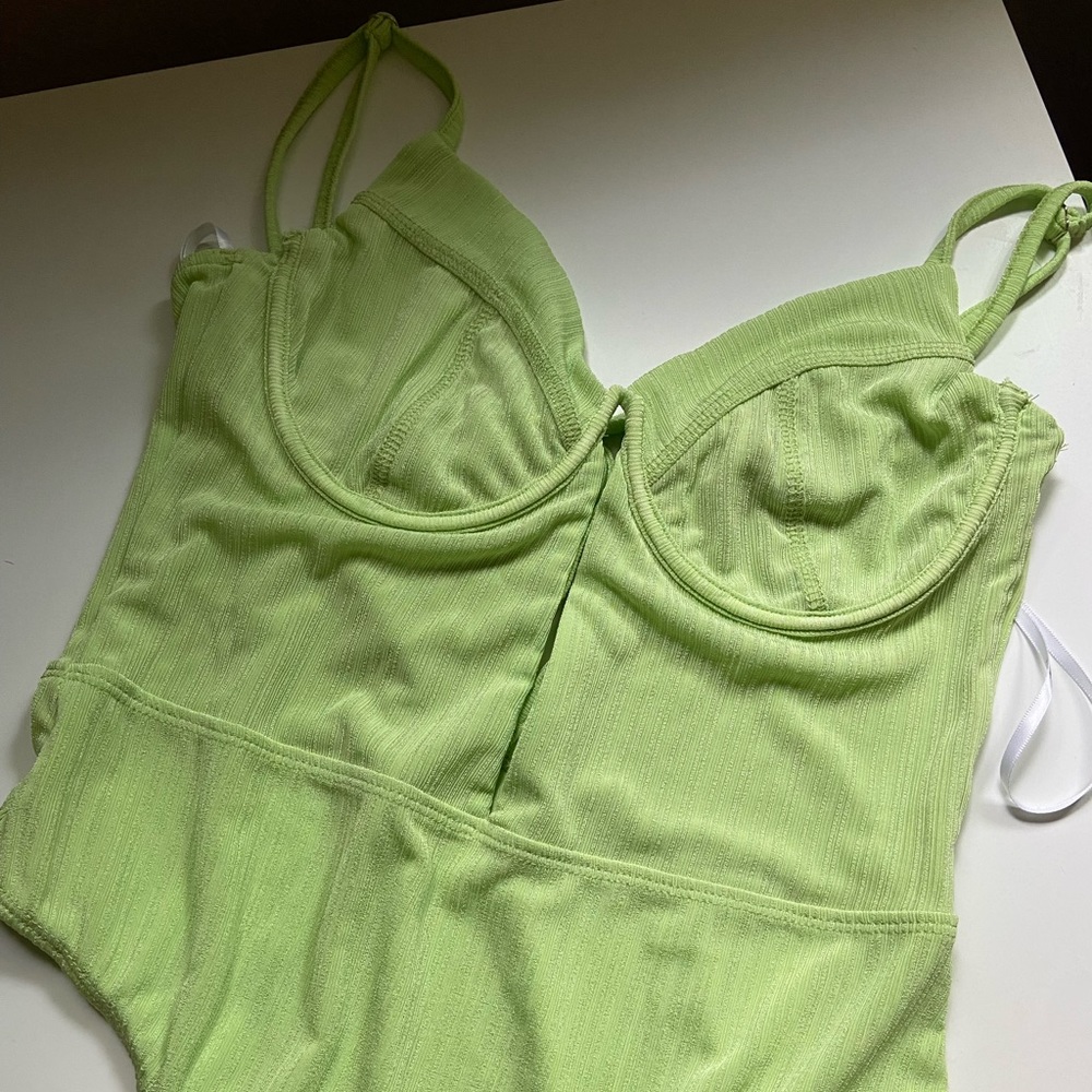 green bodysuit; lulus; new with tags; adjustable straps; cutout in middle